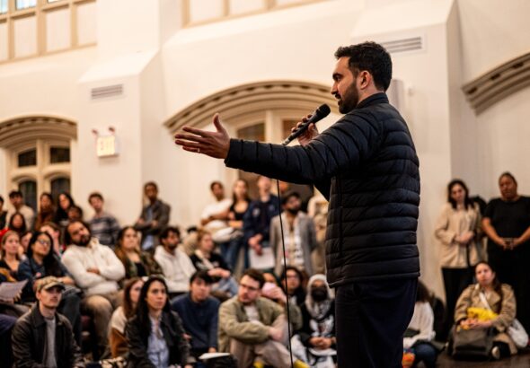Zohran_Mamdani_Speaking_at_a_DSA_101_Meeting_at_the_Church_of_the_Village_in_NYC (1)